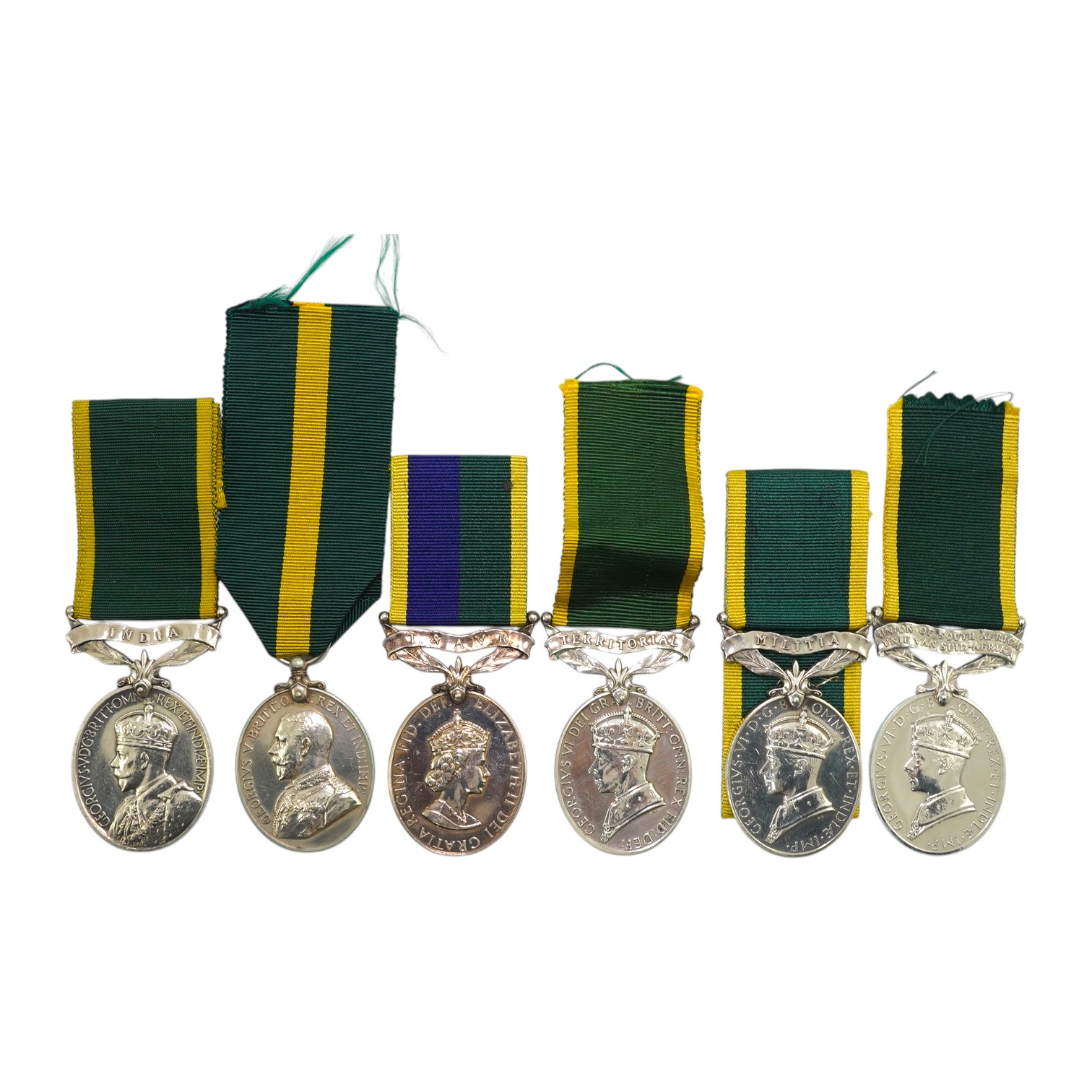 Six assorted Efficiency medals; GV (C) India to Pte.F.S.Slee,1 E.I.RY.R.,A.F.I.;GV (A) Territorial to 477046 Sjt H.W.Pawley, R.A.M.C.; GVI Militia to 2313197 Sclmn.S.H.Dummer, R.Signals.; GVI Territorial to 1434970 Gnr C